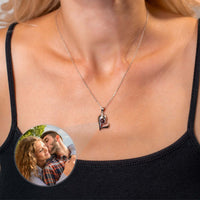 Thumbnail for Half-Heart Photo Necklace Set featuring a heart-shaped pendant with a photo of a happy couple by Brother & Sisters.