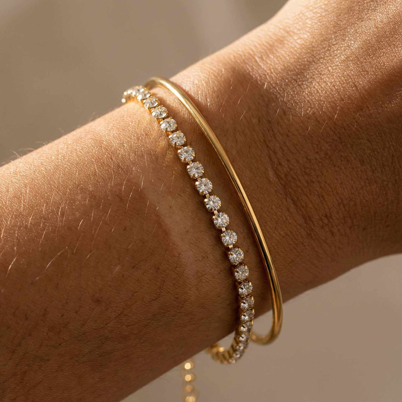 Tennis Bracelet by Brother & Sisters, featuring sparkling zirconia and a sleek gold design for everyday wear.