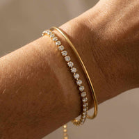 Thumbnail for Tennis Bracelet by Brother & Sisters, featuring sparkling zirconia and a sleek gold design for everyday wear.
