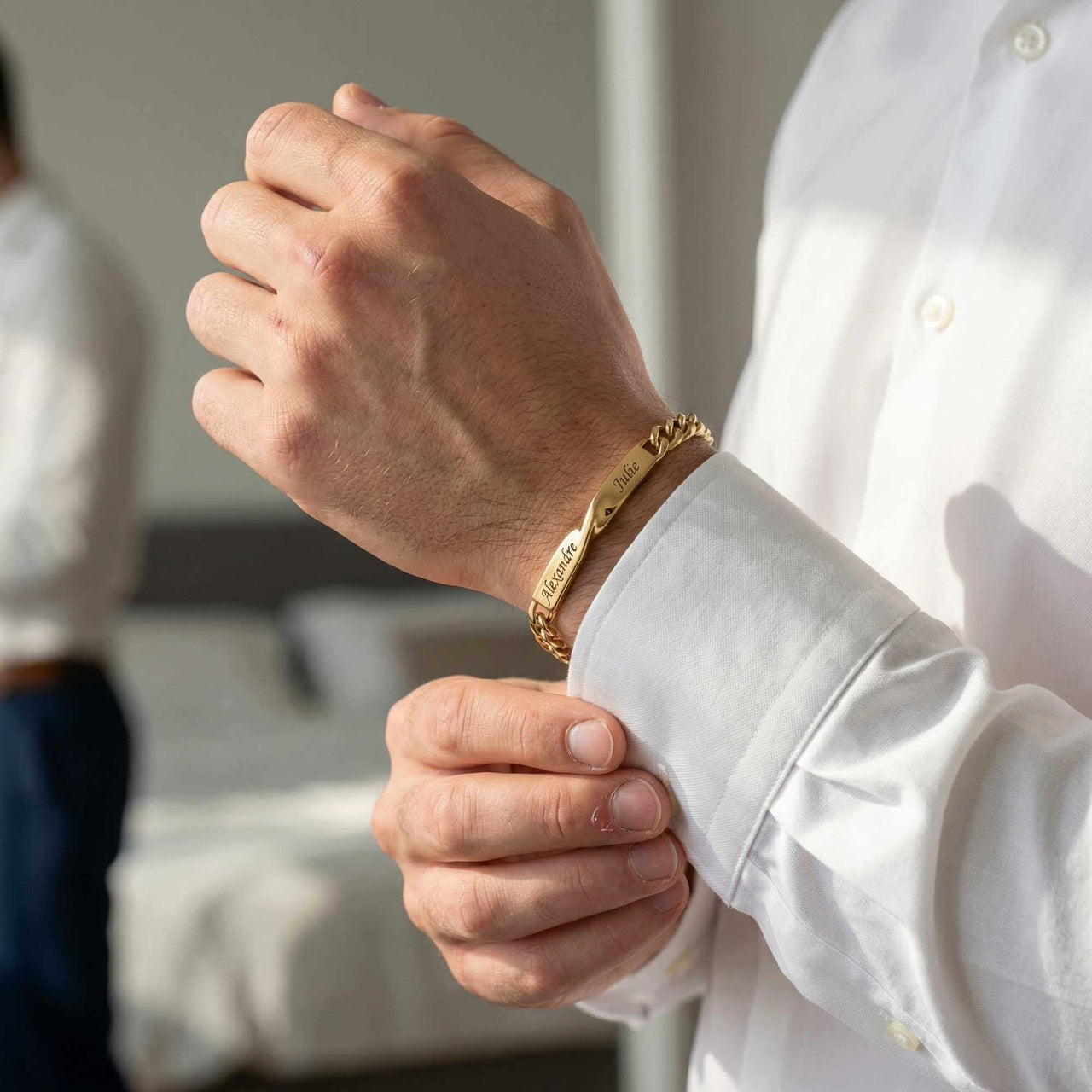 Man wearing Infinity Bond Matching Bracelet by Brother & Sisters, showcasing its beautiful twisted design.