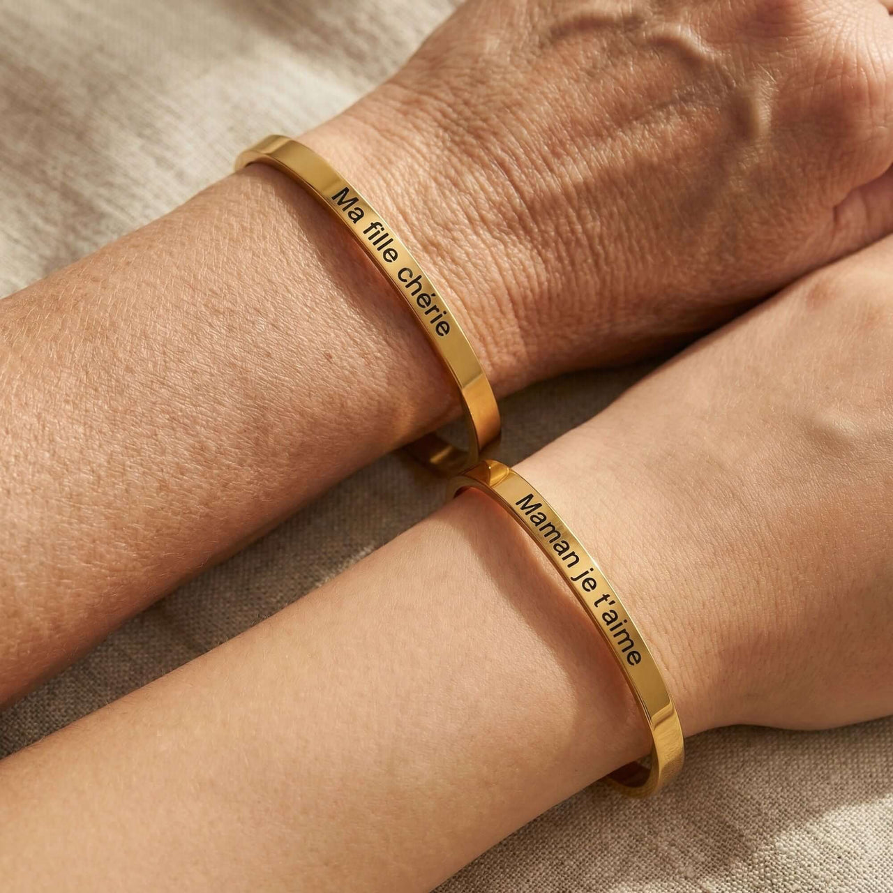 Matching Couple Bracelet by Brother & Sisters featuring engraved names for a personal touch.