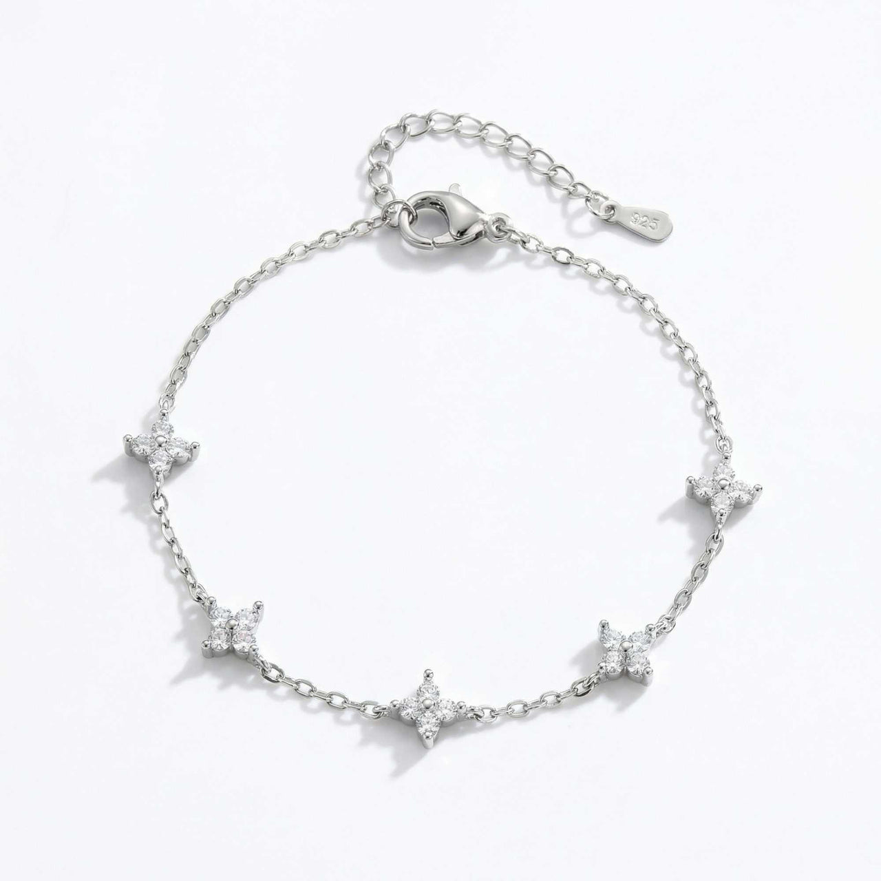 Crystal Flower Bracelet by Brother & Sisters featuring five sparkling four-leaf crystal flowers on a fine chain.