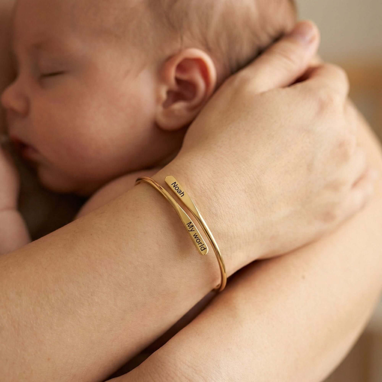 Wrap Couple Bracelet featuring custom engraving of names on a delicate bypass cuff by Brother & Sisters.