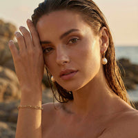 Thumbnail for Freshwater Pearl Bracelet worn by a model, showcasing unique pearls and sun-kissed skin, by Brother & Sisters.