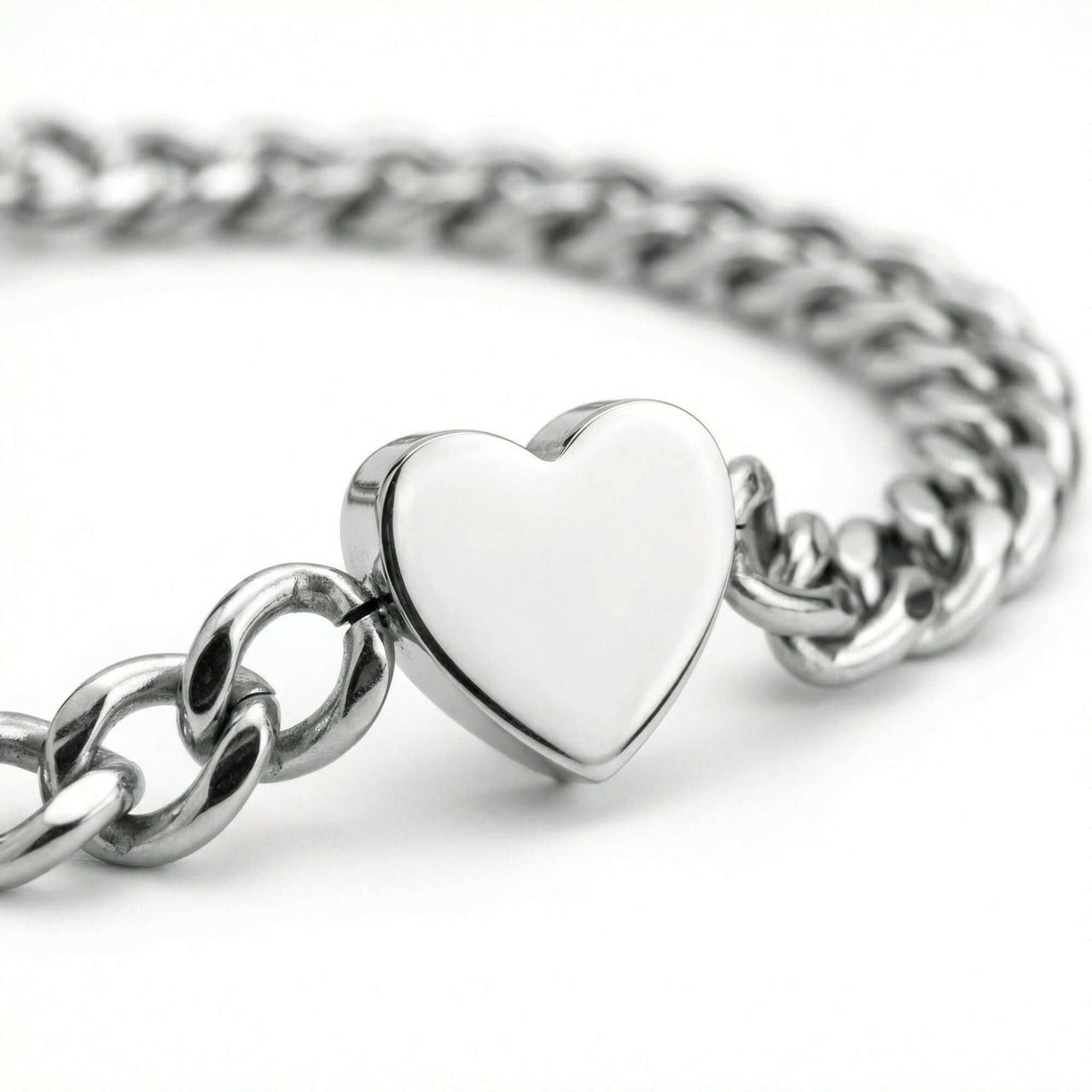 Love Couple Bracelet featuring a polished heart on a Cuban link chain by Brother & Sisters.