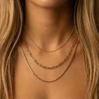 Thumbnail for Saona Triple Layer Necklace featuring three gold chains at different lengths by Brother & Sisters.