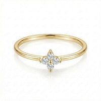 Thumbnail for Crystal Flower Ring by Brother & Sisters features a delicate gold band with zirconia stones in a four-leaf flower design.
