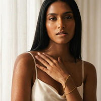 Thumbnail for Ios Layered Bracelet worn by a model, showing its elegant design by Brother & Sisters.