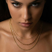 Thumbnail for Saona Triple Layer Necklace featuring three gold chains of varying lengths by Brother & Sisters.
