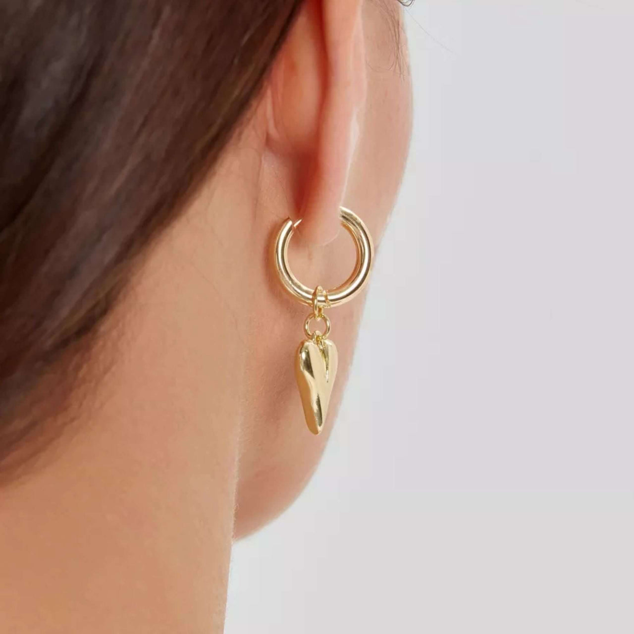 Amora Heart Drops gold earrings, heart-shaped charm, stylish hoop by Brother & Sisters.