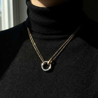 Thumbnail for The Unity Bond necklace by Brother & Sisters featuring a silver circle and gold bar in a sophisticated design.
