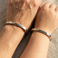 Thumbnail for Matching Couple Bracelet by Brother & Sisters showcasing engraved names on matching minimalist cuffs.
