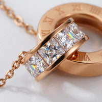 Thumbnail for Ketting met Verstrengelde Ringen en Kristal
