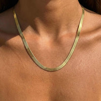 Thumbnail for The Golden Statement necklace by Brother & Sisters; luxurious herringbone design, sleek shimmer, versatile style.