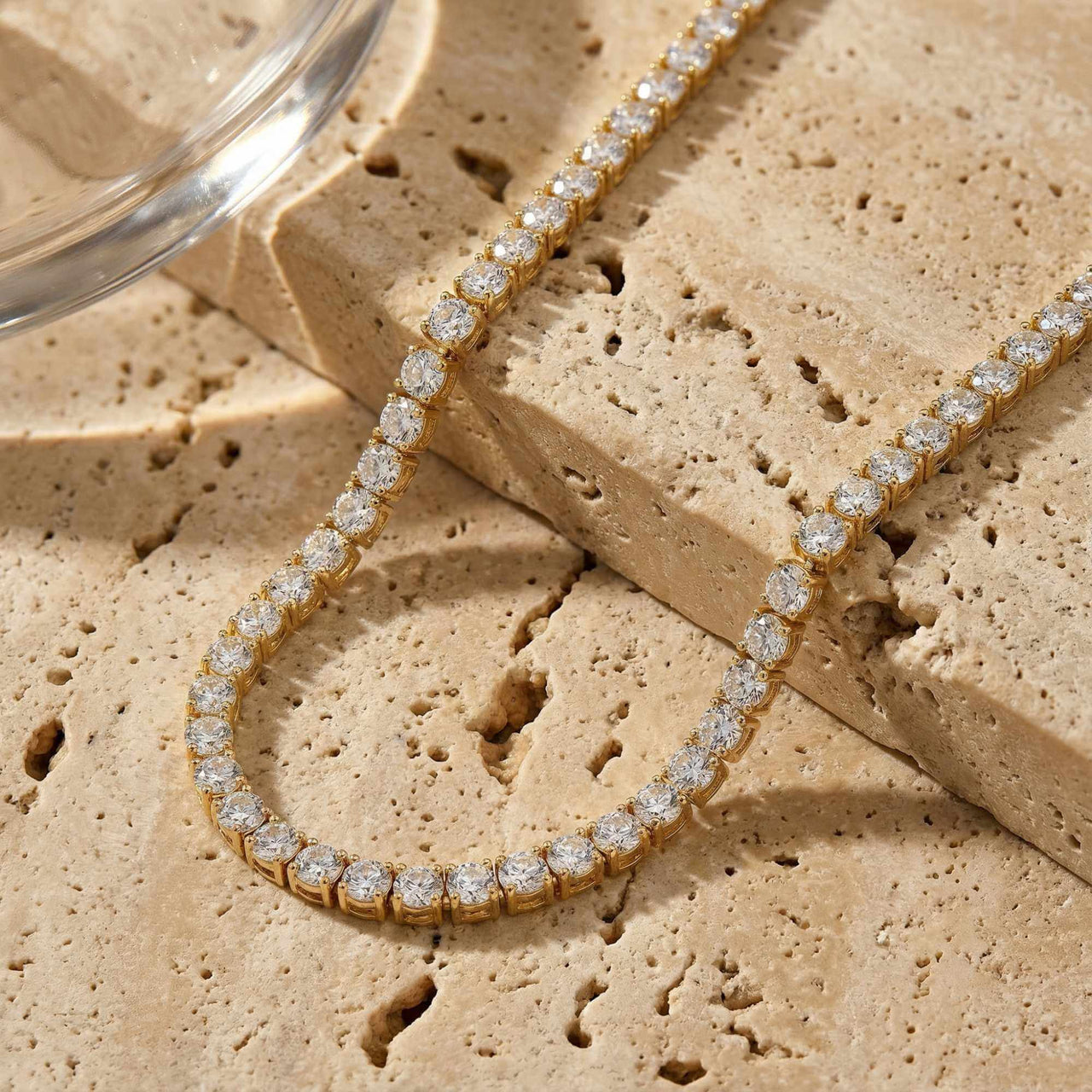 Isolde Tennis Necklace features brilliant-cut diamond simulants in 18K gold, adding glamour to any outfit by Brother & Sisters.