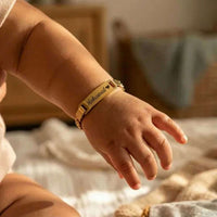 Thumbnail for Infant Bracelet personalized with the name Mohamed, crafted by Brother & Sisters for a precious keepsake.