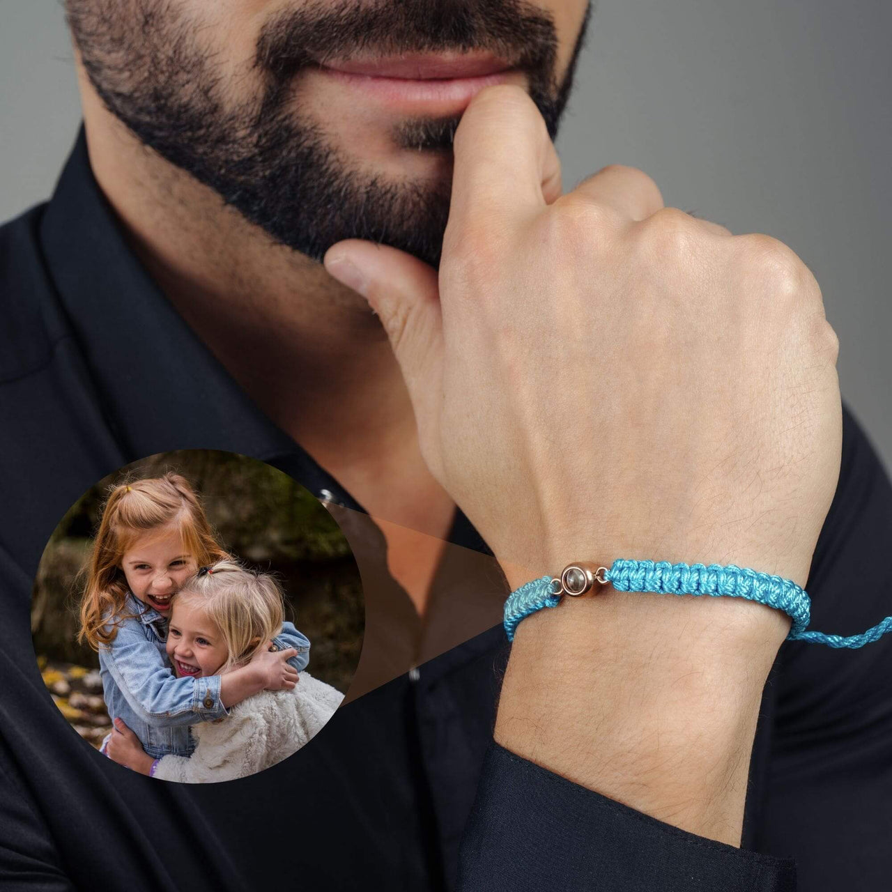 Man Blue Photo Bracelet worn by a man, featuring a circular pendant with a photo, designed by Brother & Sisters.