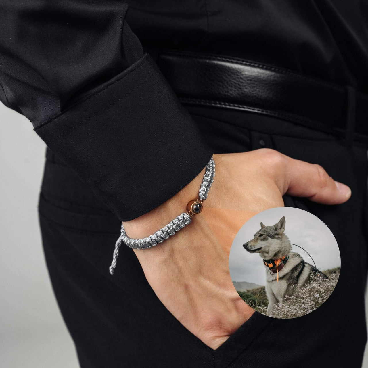 Man Grey Photo Bracelet worn by a man, featuring a custom photo pendant of a dog, by Brother & Sisters.