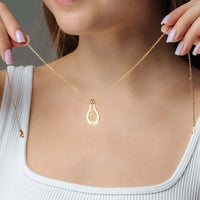 Thumbnail for Birth Flower Name Necklace from Brother & Sisters, featuring a golden pendant with a birth flower design.