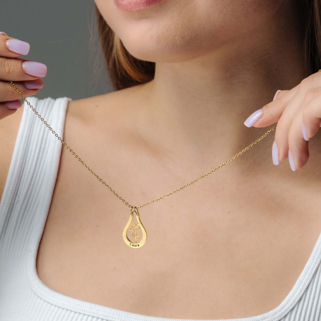 Birth Flower Name Necklace by Brother & Sisters, showcasing personalized birth flower design worn by a model.