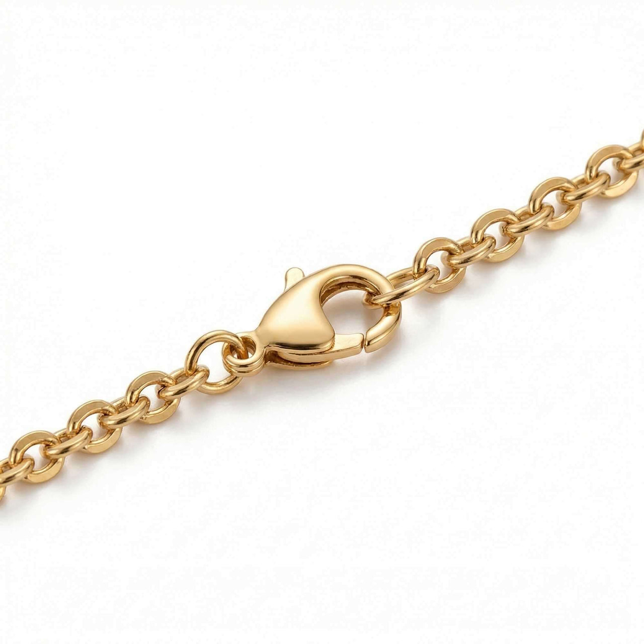 Close-up of the clasp on the Precious Name Necklace by Brother & Sisters, featuring a gold-toned chain.