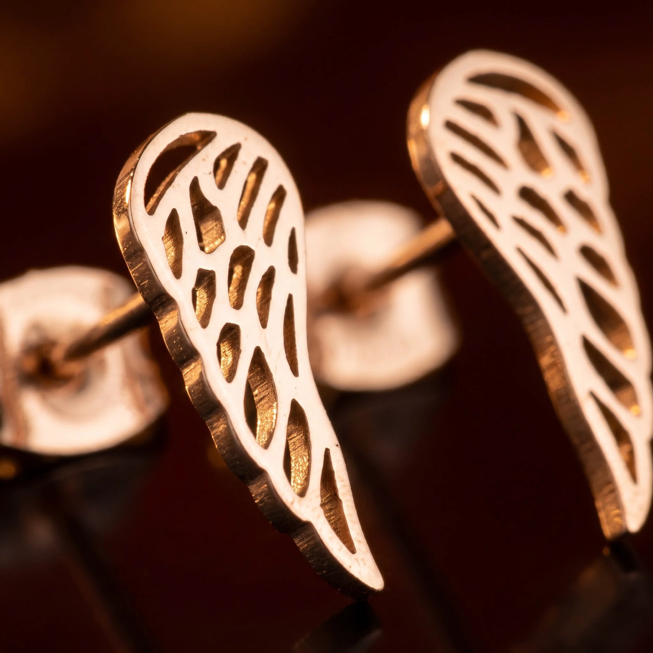 Close-up of the rose gold stud earrings | SKU: 42008-rose-gold