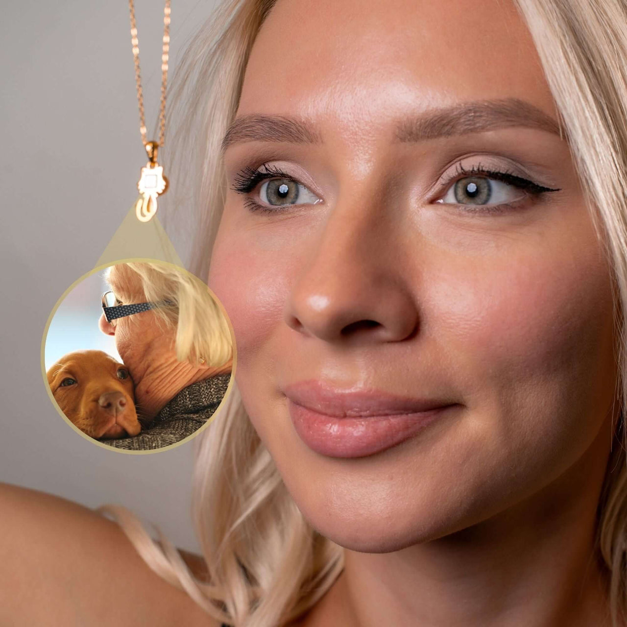 Woman wearing an Animal Photo Necklace featuring her pet's photo, from Brother & Sisters, capturing cherished memories.