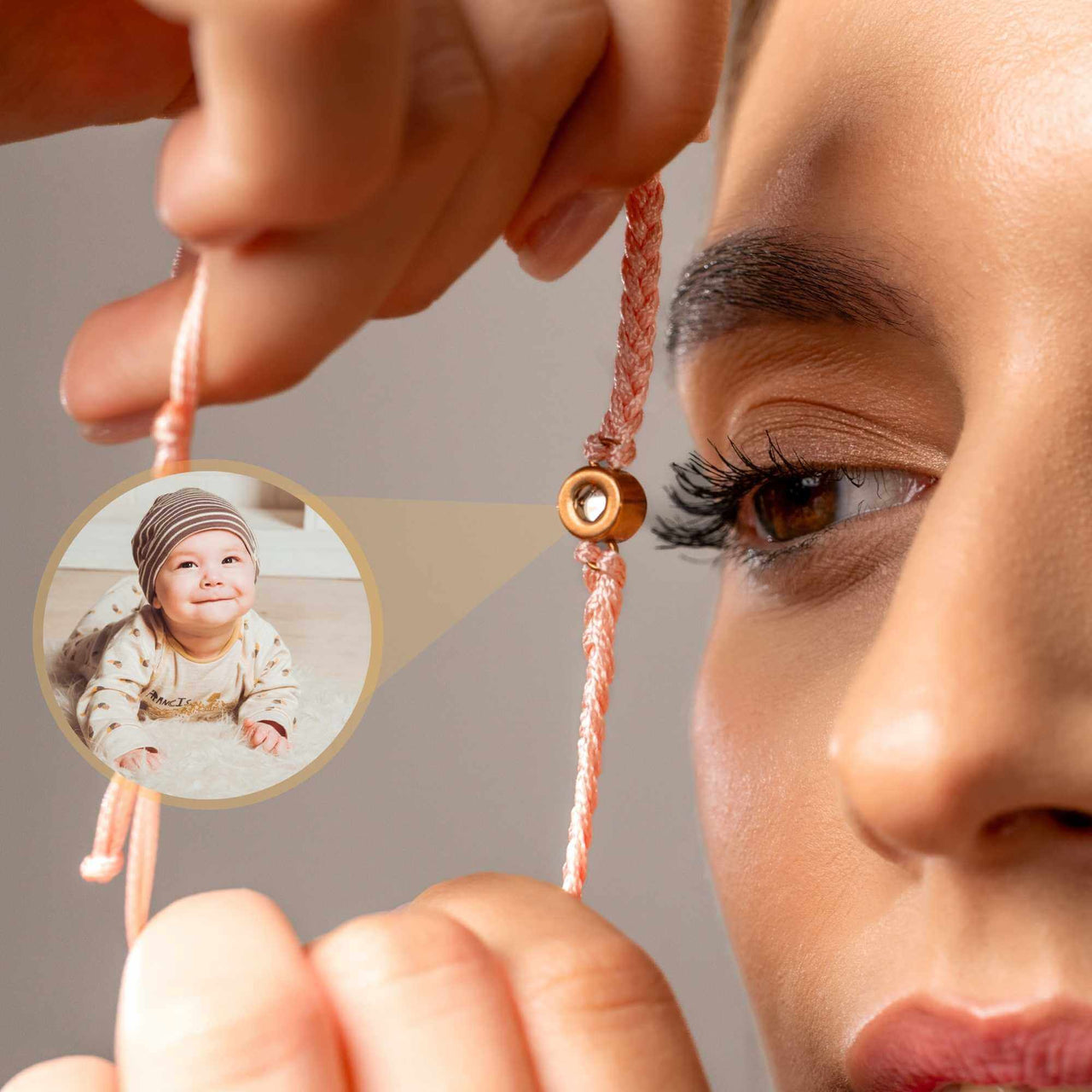 Model showcasing the Pink Photo Bracelet by Brother & Sisters with a personalized photo pendant.