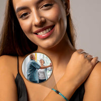 Thumbnail for Blue Photo Bracelet worn by a woman, featuring a personalized photo pendant highlighting cherished memories. Brother & Sisters.