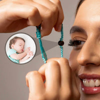 Thumbnail for Woman wearing Blue Photo Bracelet featuring a personalized photo of a sleeping baby. Custom jewelry by Brother & Sisters.