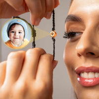 Thumbnail for Black Photo Bracelet featuring personalized circle pendant with a cherished photo of a smiling child by Brother & Sisters.