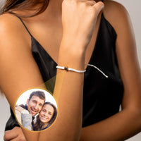 Thumbnail for White Photo Bracelet worn on a woman's wrist featuring a personalized photo pendant by Brother & Sisters.
