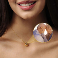 Thumbnail for Circular Photo Necklace worn by a woman with a hidden photo of a loved one in the pendant by Brother & Sisters.