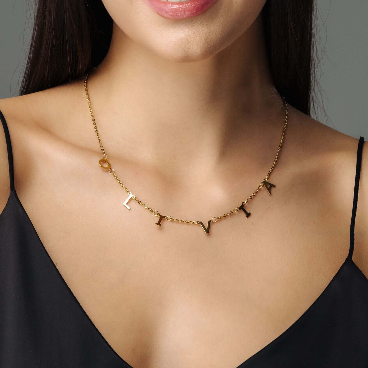 Classic Name Necklace featuring personalized gold letters on a sleek chain, designed by Brother & Sisters.