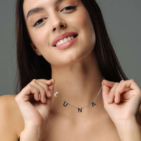 Thumbnail for Classic Name Necklace by Brother & Sisters worn by model, showcasing the name LUNA in high-quality titanium steel.