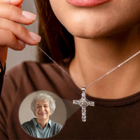 Thumbnail for Close-up of a woman wearing a Cross Photo Necklace featuring a customizable photo projection by Brother & Sisters.