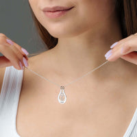 Thumbnail for Birth Flower Name Necklace displayed on a model, featuring custom birth flower charm and chain by Brother & Sisters.