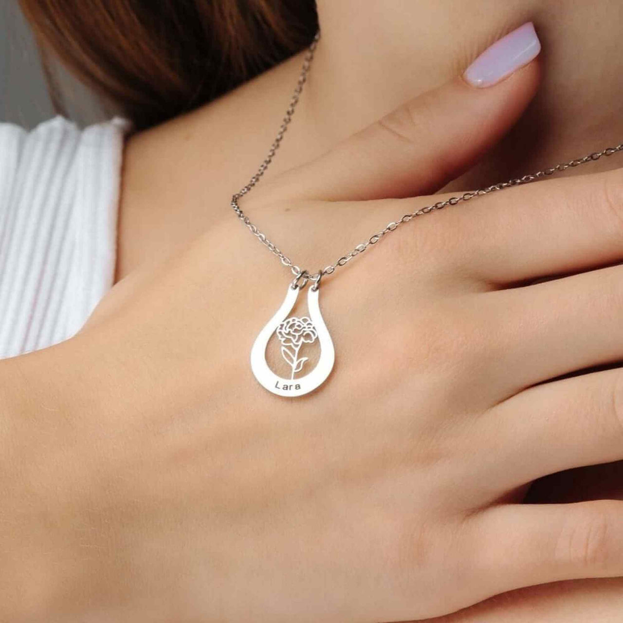 Birth Flower Name Necklace by Brother & Sisters, featuring custom name 'Lara' and elegant flower design.