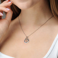 Thumbnail for Birth Flower Name Necklace worn by a woman, featuring a personalized birth flower pendant, by Brother & Sisters.