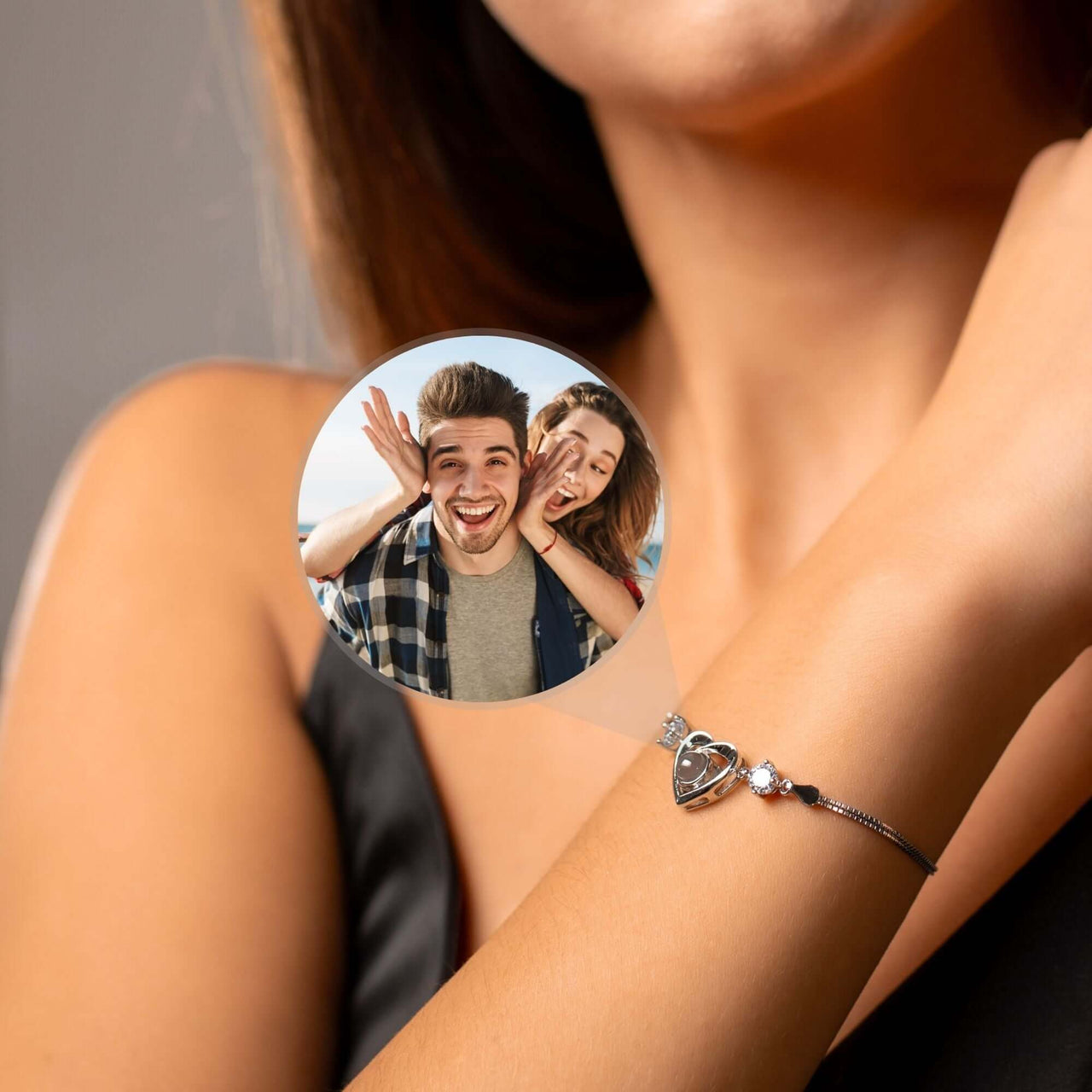 Diamond Photo Bracelet featuring a photo pendant of a happy couple by Brother & Sisters