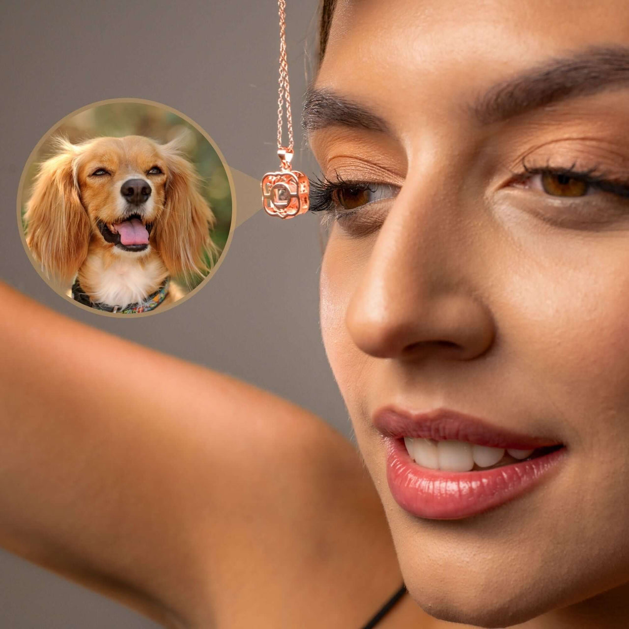 A woman showcasing the Double Heart Photo Necklace by Brother & Sisters with a hidden pet photo projection.
