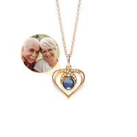 Thumbnail for Eternal Photo Necklace by Brother & Sisters with heart charm and photo projection of a couple.