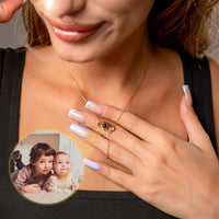 Thumbnail for Eye Photo Necklace worn by a woman, featuring a customizable eye-shaped pendant from Brother & Sisters.