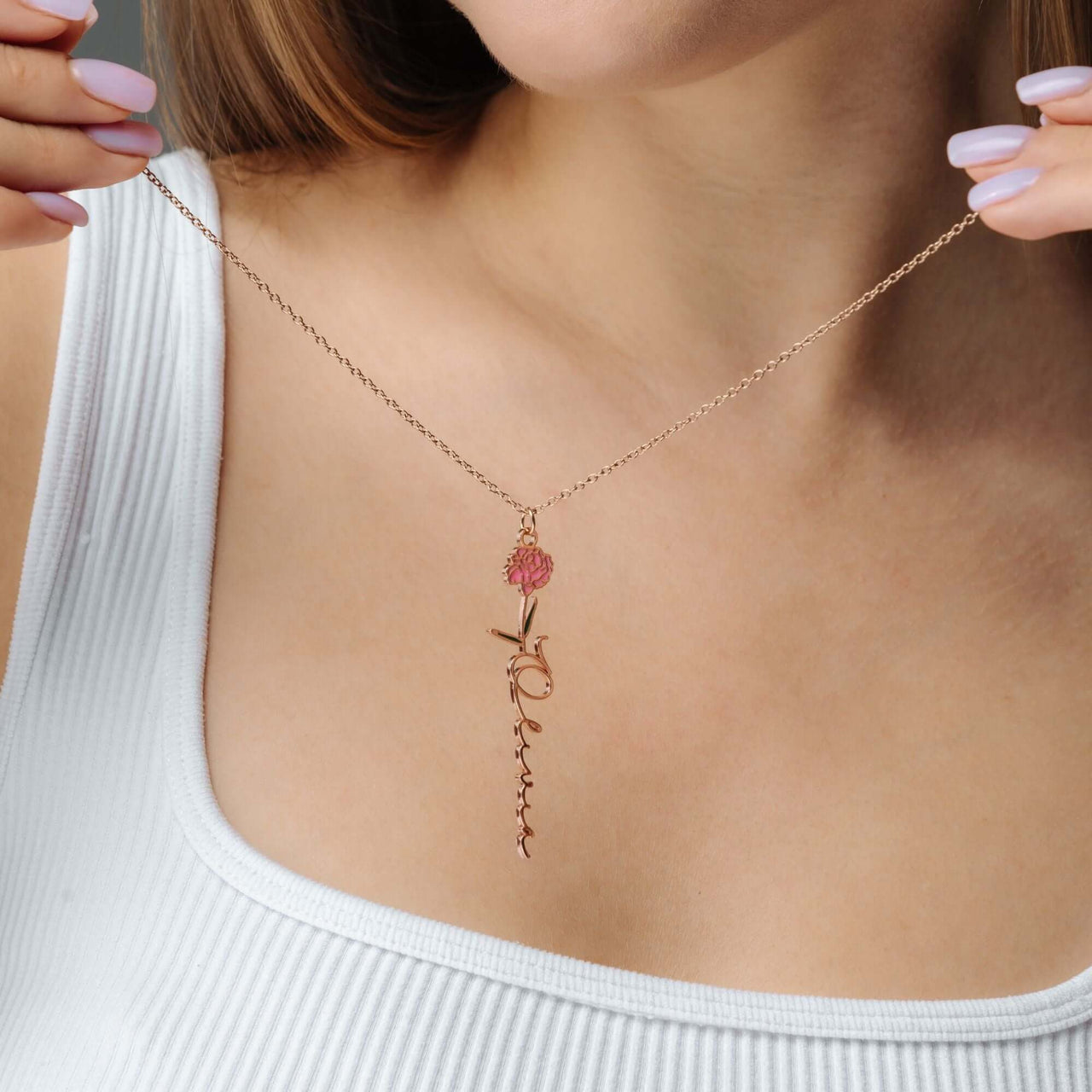 Flower Name Necklace by Brother & Sisters featuring delicate floral accent and personalized name design.