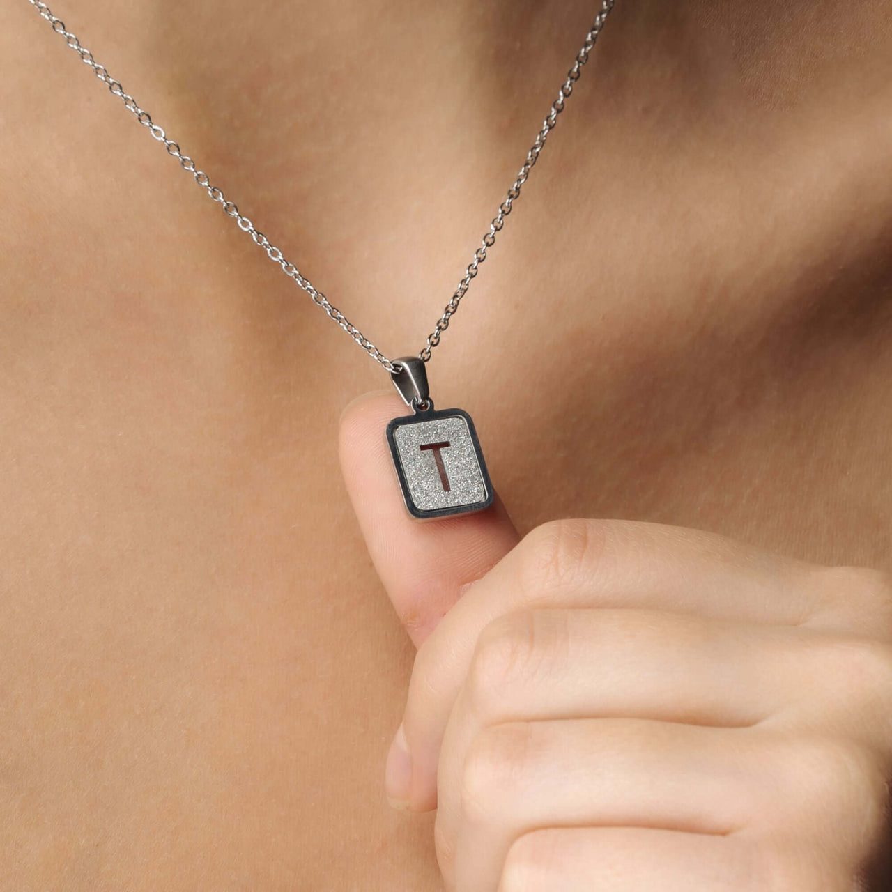 Glitter Initial Necklace with letter T pendant featuring sparkling details by Brother & Sisters on a silver chain.