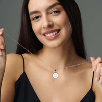 Thumbnail for Woman wearing Dreamy Initial Necklace with personalized letter pendant, showcasing elegance and style by Brother & Sisters.