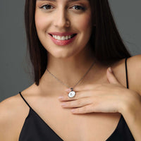 Thumbnail for Woman wearing a Dreamy Initial Necklace with letter L, showcasing personalized elegance and style by Brother & Sisters.