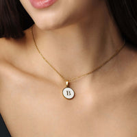 Thumbnail for Dreamy Initial Necklace on a woman, featuring a gold chain and personalized initial 'B', by Brother & Sisters.