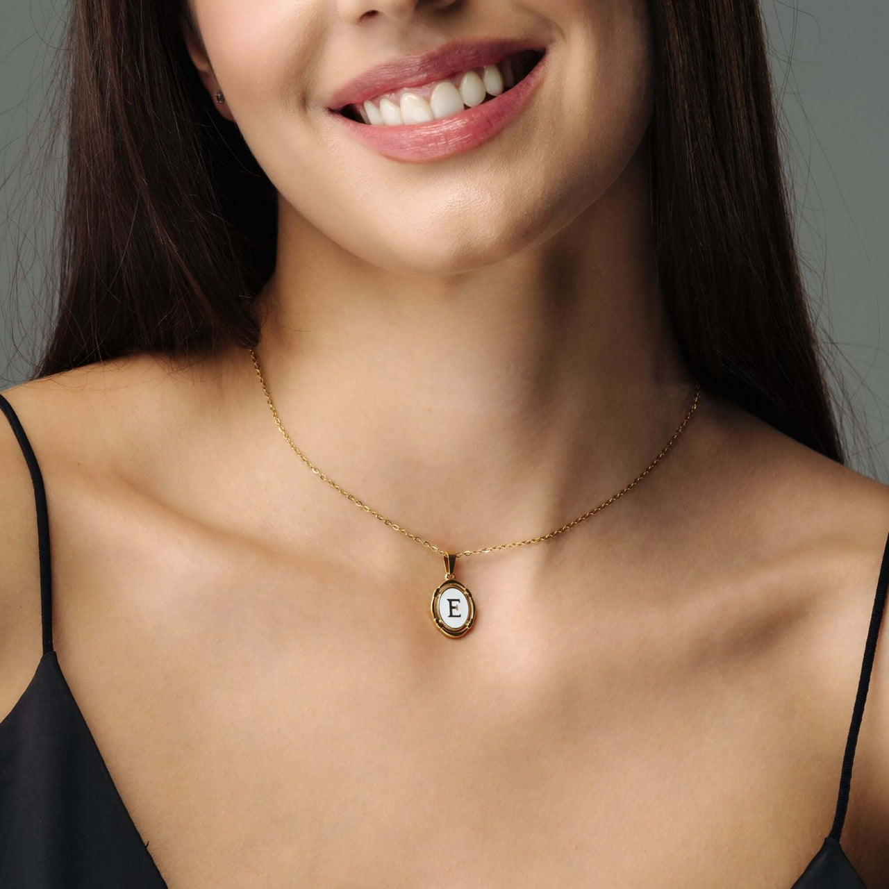 Princess Initial Necklace on woman, featuring elegant E pendant, by Brother & Sisters, perfect gold jewelry for women.