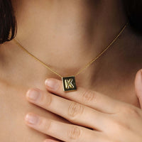 Thumbnail for Rectangle Initial Necklace with a gold square pendant featuring the letter K, by Brother & Sisters.